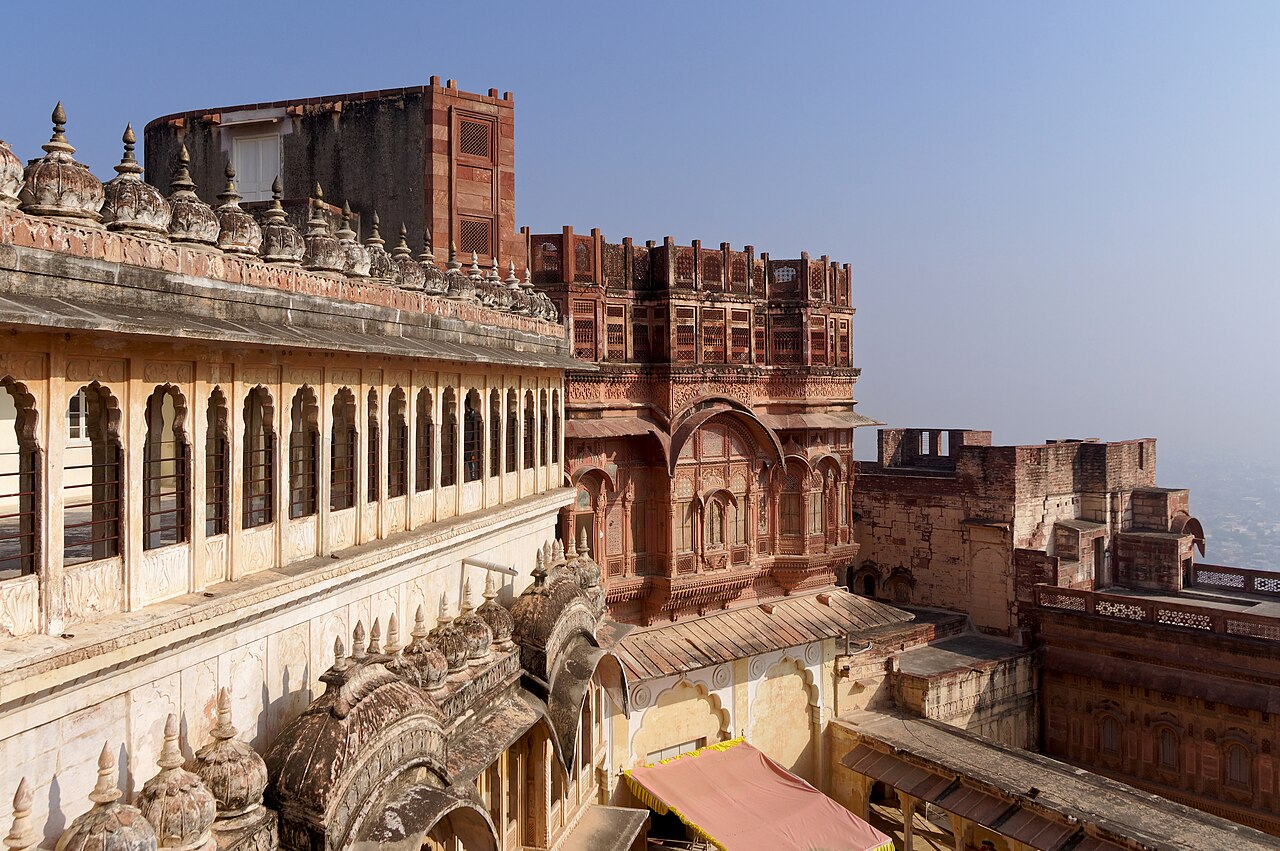 Mehrangarh courtyard with carved sandstone and cream colonnades