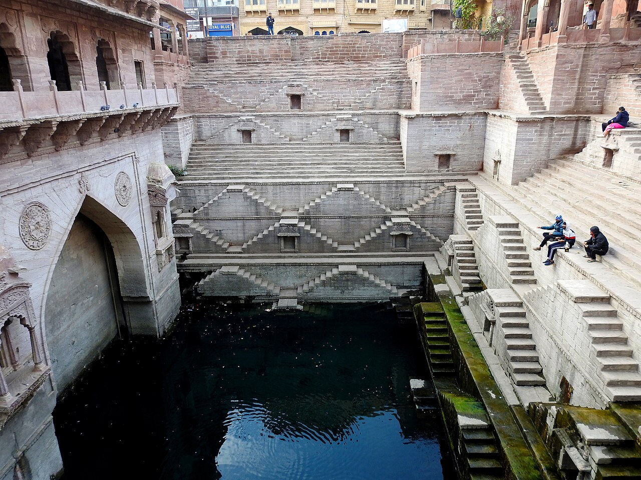 Geometric sandstone steps around Toorji ka Jhalra